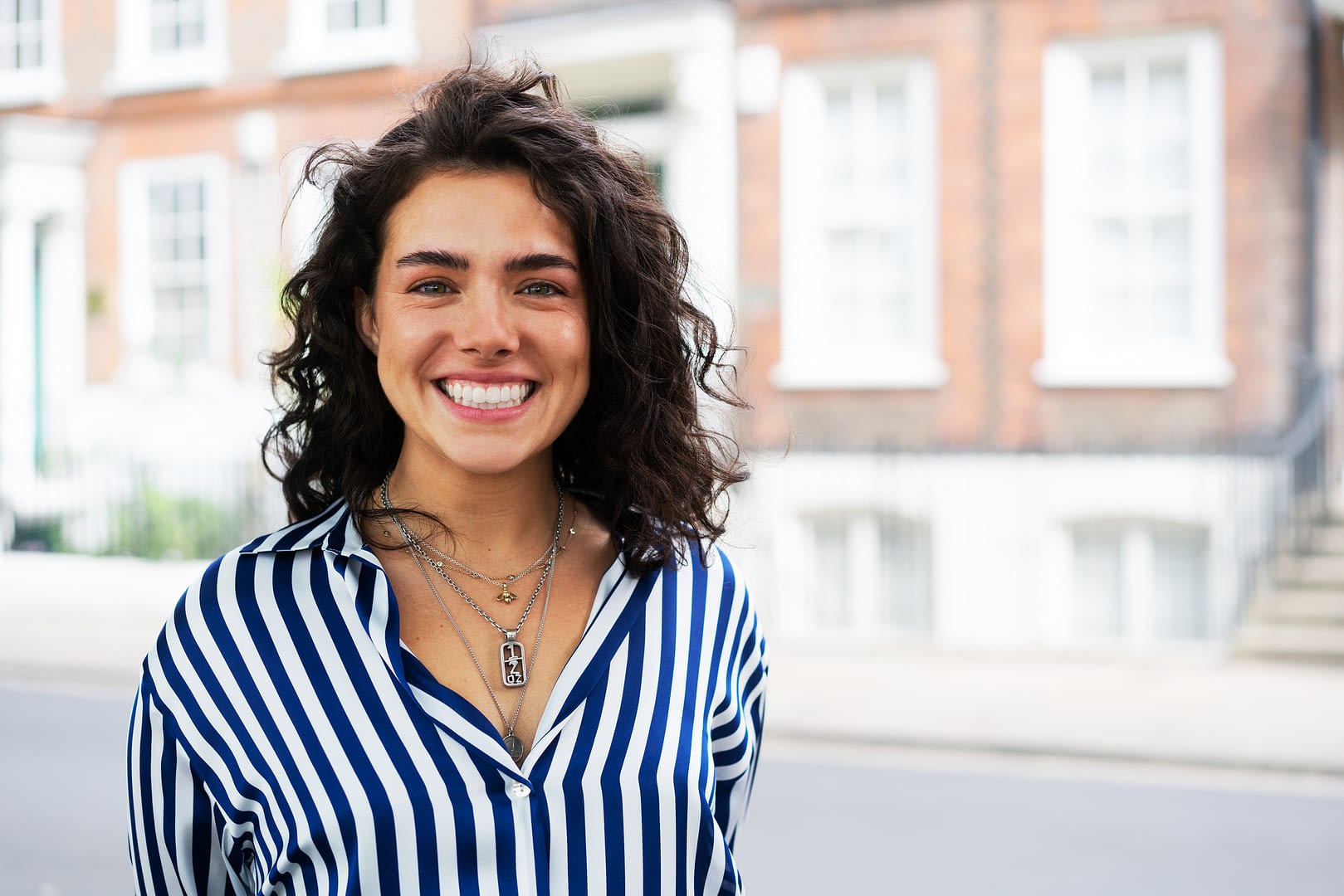 Woman smiling and looking at camera