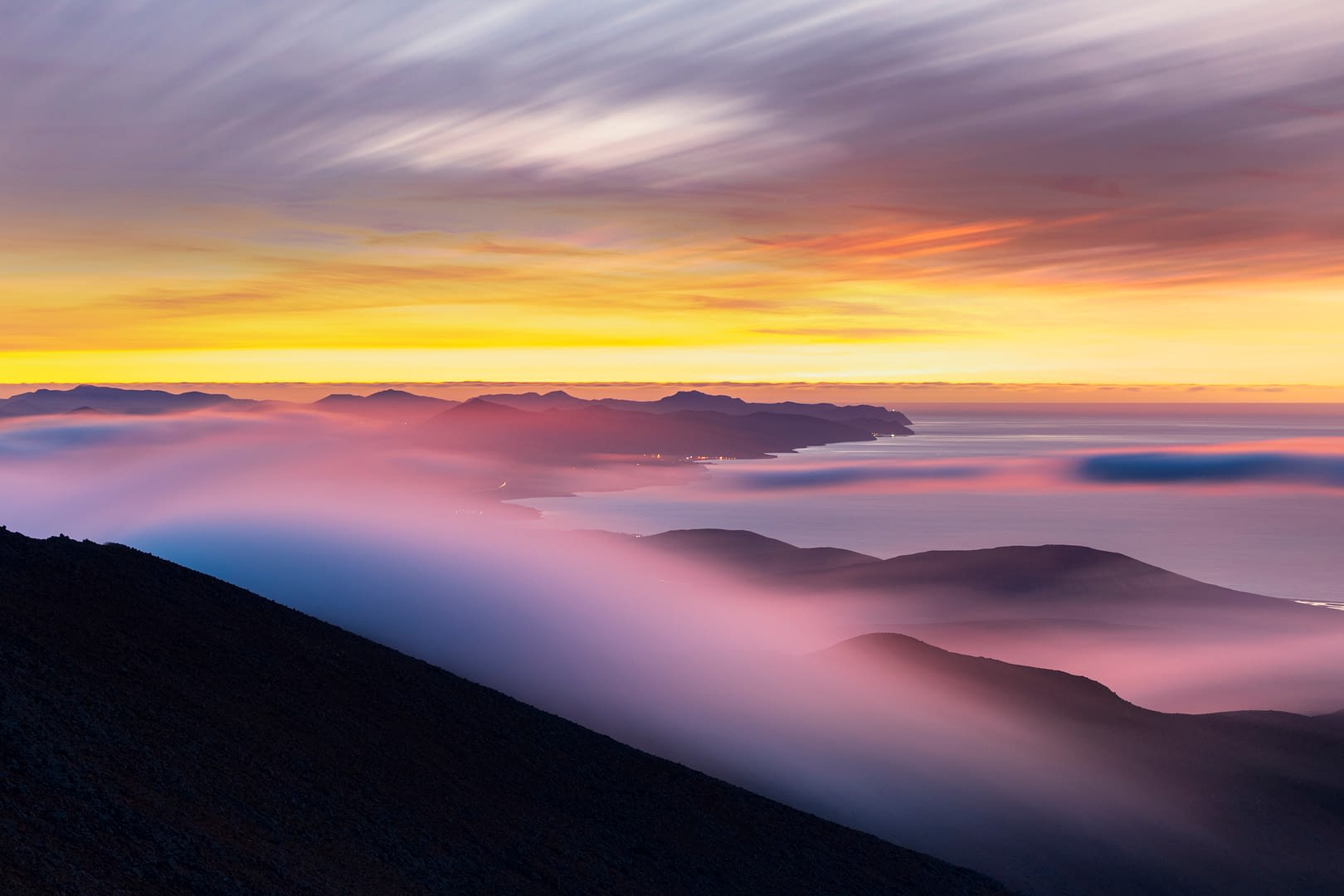 Multicolored sky with fog at dawn, Canary Islands