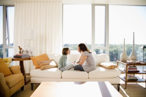 mother and daughter on couch